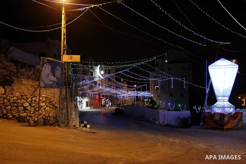 A large Ramadan lantern is seen during the holy fasting month of Ramadan in the West Bank city of Hebron, June 16, 2016. Muslims around the world celebrate Ramadan, the holy month in the Islamic calendar, in which they a...