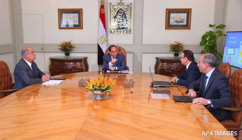 Egyptian President Abdel Fattah al-Sisi meets with Egyptian Prime Minister Sharif Ismail in Cairo, Egypt on June 16, 2016. Photo by Egyptian President Office