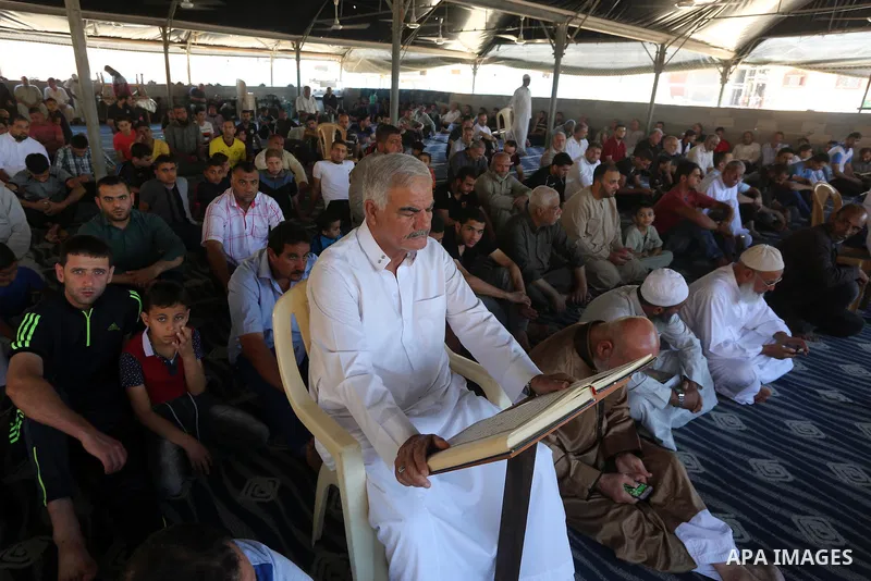 Palestinian Muslim worshippers perform the second Friday prayers of the holy Muslim fasting month of Ramadan at a mosque which was destroyed during the 50-day war between Israel and Hamas militants in the summer of 2014,...