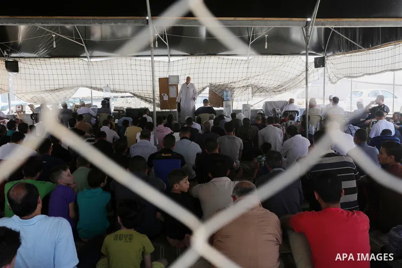 Palestinian Muslim worshippers perform the second Friday prayers of the holy Muslim fasting month of Ramadan at a mosque which was destroyed during the 50-day war between Israel and Hamas militants in the summer of 2014,...
