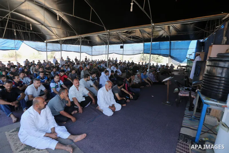 Palestinian Muslim worshippers perform the second Friday prayers of the holy Muslim fasting month of Ramadan at a mosque which was destroyed during the 50-day war between Israel and Hamas militants in the summer of 2014,...