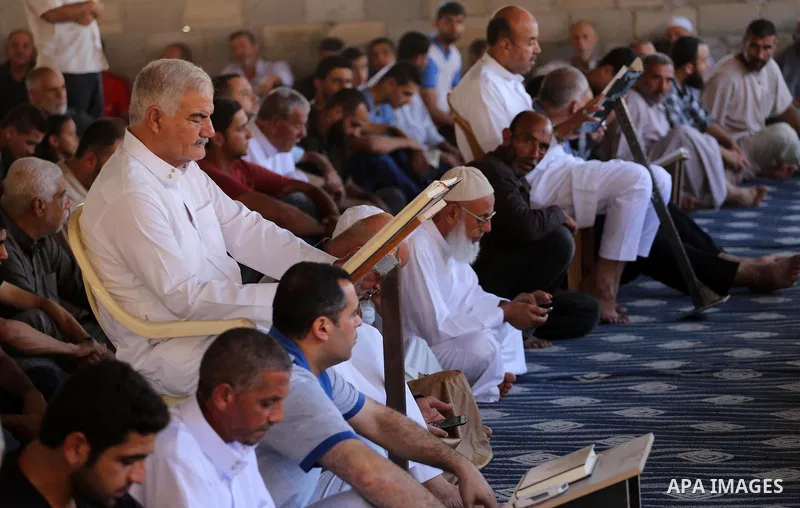 Palestinian Muslim worshippers perform the second Friday prayers of the holy Muslim fasting month of Ramadan at a mosque which was destroyed during the 50-day war between Israel and Hamas militants in the summer of 2014,...
