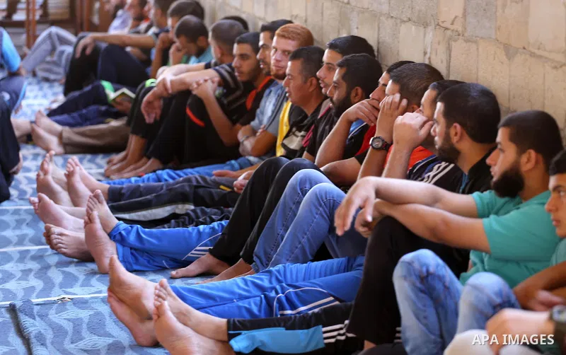 Palestinian Muslim worshippers perform the second Friday prayers of the holy Muslim fasting month of Ramadan at a mosque which was destroyed during the 50-day war between Israel and Hamas militants in the summer of 2014,...