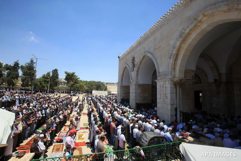 Palestinian Muslim worshippers perform Friday prayer at the al-Aqsa mosque compound in Jerusalem's old city on June 17, 2016 during the holy fasting month of Ramadan. Around 53,000 Palestinians from the West Bank were al...
