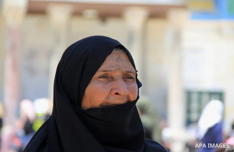 Palestinian women perform Friday prayer at the al-Aqsa mosque compound in Jerusalem's old city on June 17, 2016 during the holy fasting month of Ramadan. Around 53,000 Palestinians from the West Bank were allowed into Je...
