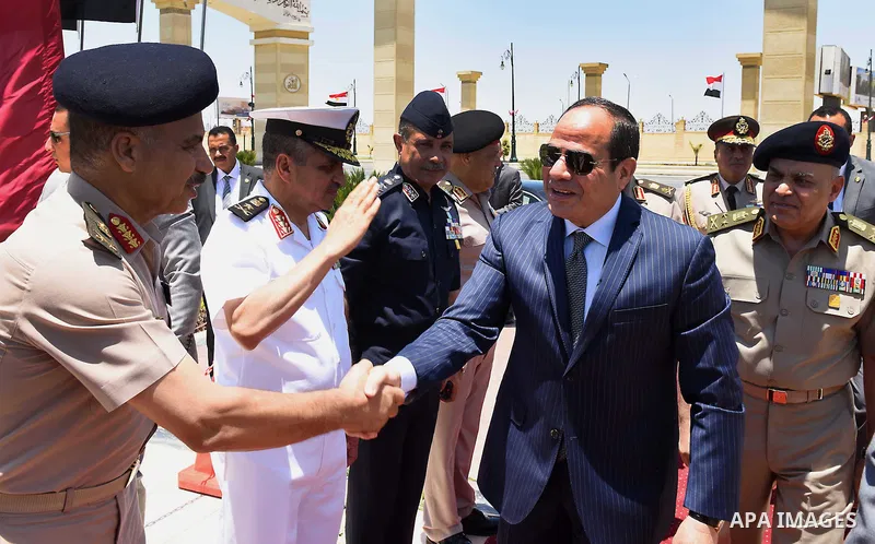 Egyptian President Abdel Fattah al-Sisi performs Friday prayers at Al-Tantawi mosque, to mark the anniversary of the Tenth of Ramadan, in Cairo, Egypt, on June 17, 2016. Photo by Egyptian President Office