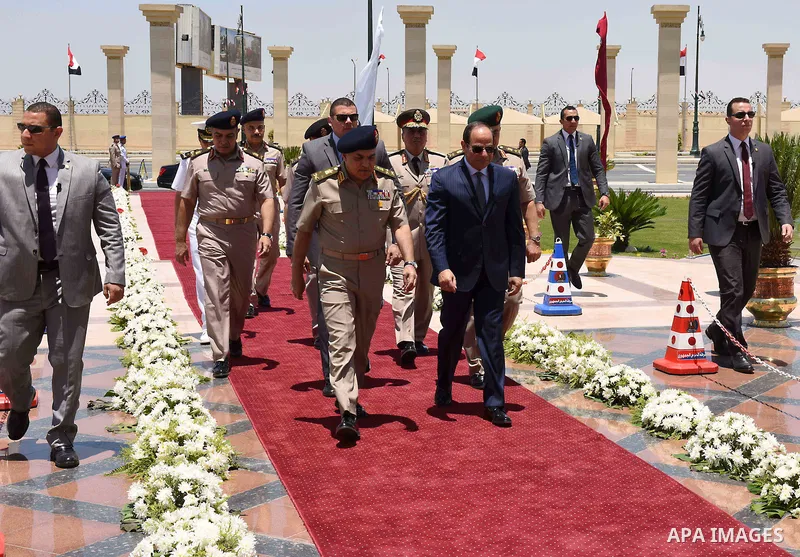 Egyptian President Abdel Fattah al-Sisi performs Friday prayers at Al-Tantawi mosque, to mark the anniversary of the Tenth of Ramadan, in Cairo, Egypt, on June 17, 2016. Photo by Egyptian President Office