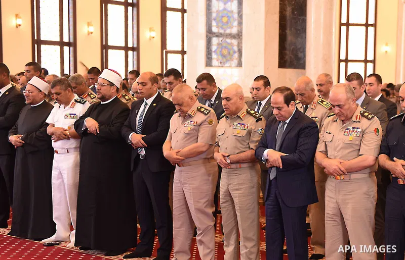 Egyptian President Abdel Fattah al-Sisi performs Friday prayers at Al-Tantawi mosque, to mark the anniversary of the Tenth of Ramadan, in Cairo, Egypt, on June 17, 2016. Photo by Egyptian President Office