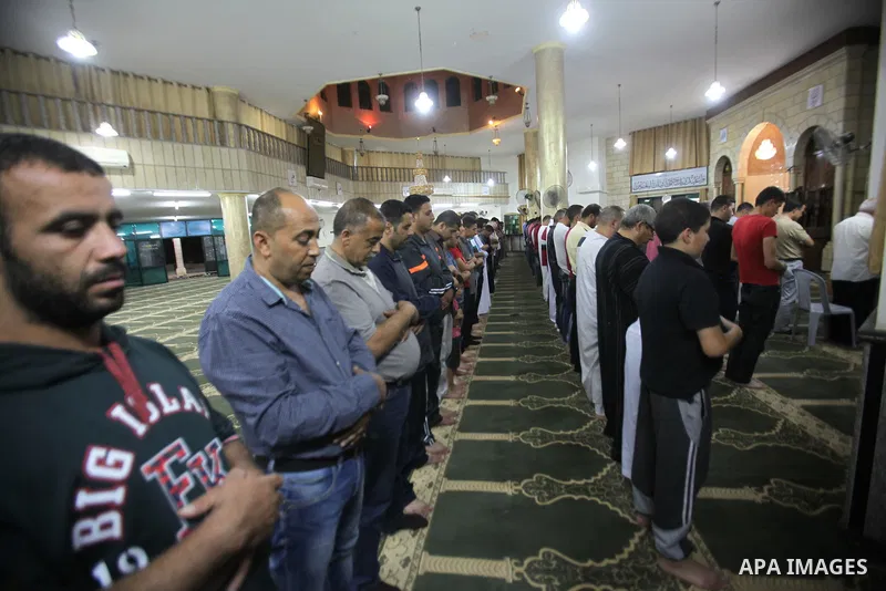 Palestinian Muslim worshipers perform "Taraweeh", nightly prayer of the month of Ramadan, in the West bank city of Nablus, on June 17, 2016. Ramadan is sacred to Muslims because it is during that month that tradition say...