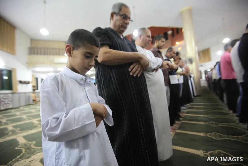 Palestinian Muslim worshipers perform "Taraweeh", nightly prayer of the month of Ramadan, in the West bank city of Nablus, on June 17, 2016. Ramadan is sacred to Muslims because it is during that month that tradition say...