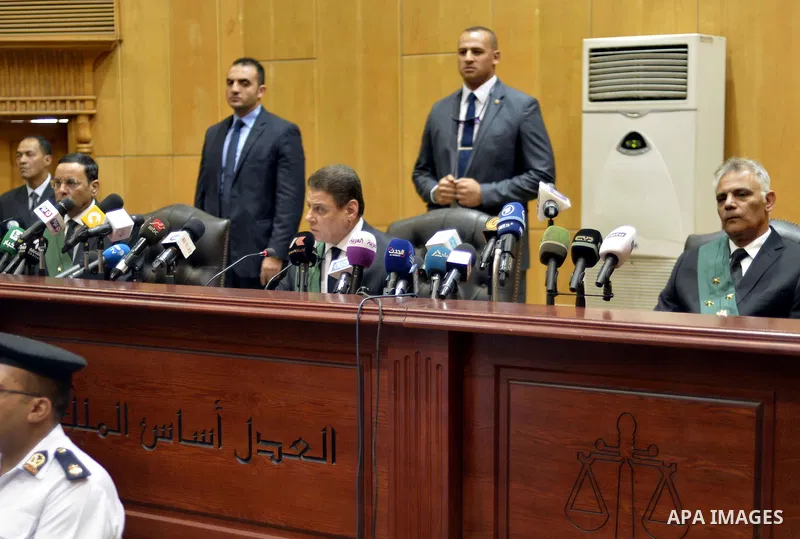An Egyptian Judge Mohamed Sirin Fahmy conducts the trial of Egypt's ousted President Mohamed Morsi at a court in Cairo on June 18, 2016. An Egyptian court sentenced Morsi to life in prison in an espionage trial in which...