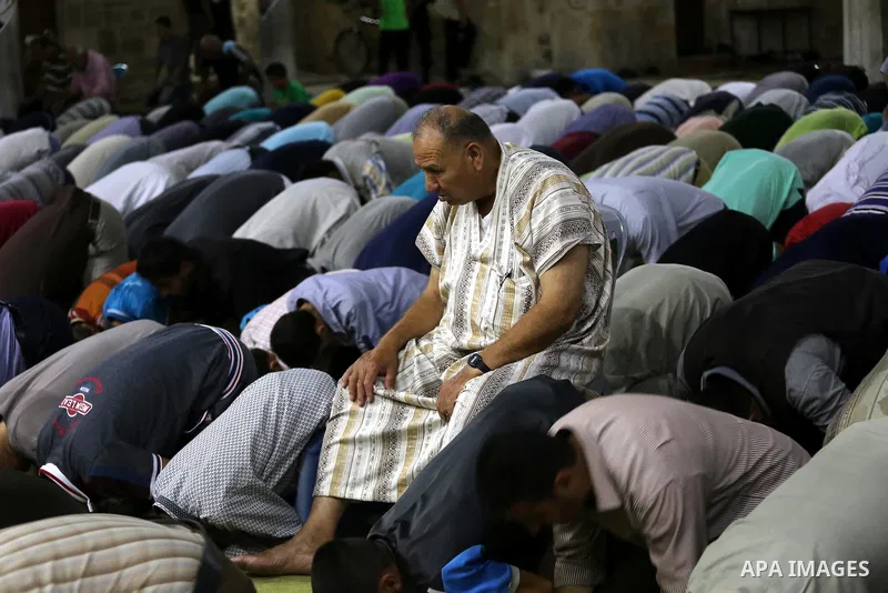 Palestinian Muslim worshipers perform "Taraweeh", nightly prayer of the month of Ramadan in Gaza city on June 19, 2016. Ramadan is sacred to Muslims because it is during that month that tradition says the Koran was revea...