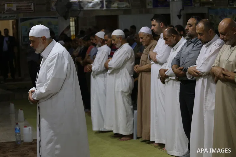 Senior Hamas leader Ismail Haniyeh, performs "Taraweeh", nightly prayer of the month of Ramadan in Gaza city on June 19, 2016. Ramadan is sacred to Muslims because it is during that month that tradition says the Koran wa...