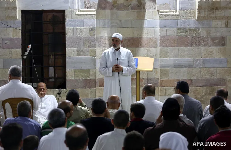 Senior Hamas leader Ismail Haniyeh, performs "Taraweeh", nightly prayer of the month of Ramadan in Gaza city on June 19, 2016. Ramadan is sacred to Muslims because it is during that month that tradition says the Koran wa...
