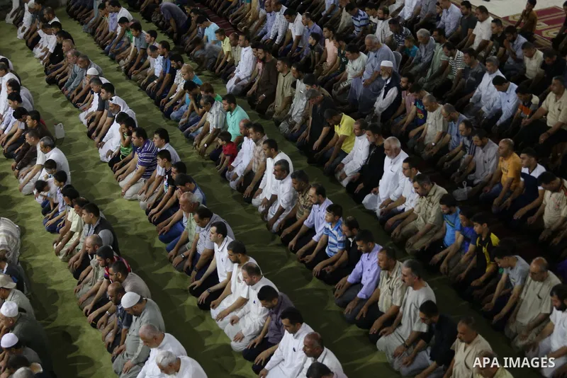 Palestinian Muslim worshipers perform "Taraweeh", nightly prayer of the month of Ramadan in Gaza city on June 19, 2016. Ramadan is sacred to Muslims because it is during that month that tradition says the Koran was revea...