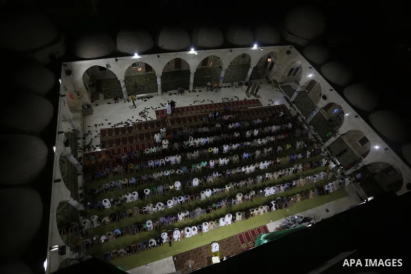 Palestinian Muslim worshipers perform "Taraweeh", nightly prayer of the month of Ramadan in Gaza city on June 19, 2016. Ramadan is sacred to Muslims because it is during that month that tradition says the Koran was revea...