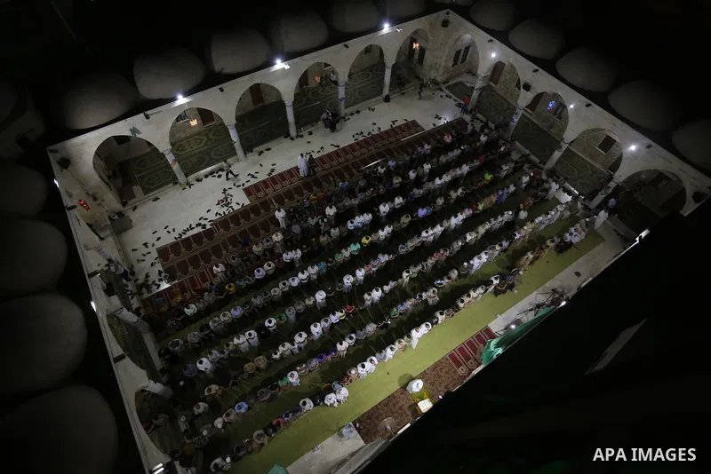 Palestinian Muslim worshipers perform "Taraweeh", nightly prayer of the month of Ramadan in Gaza city on June 19, 2016. Ramadan is sacred to Muslims because it is during that month that tradition says the Koran was revea...