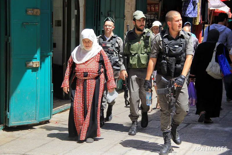 Israeli policemen stand guard at a market during the holy fasting month of Ramadan, in Jerusalem's old city on June 20, 2016. Ramadan is sacred to Muslims because it is during that month that tradition says the Koran was...