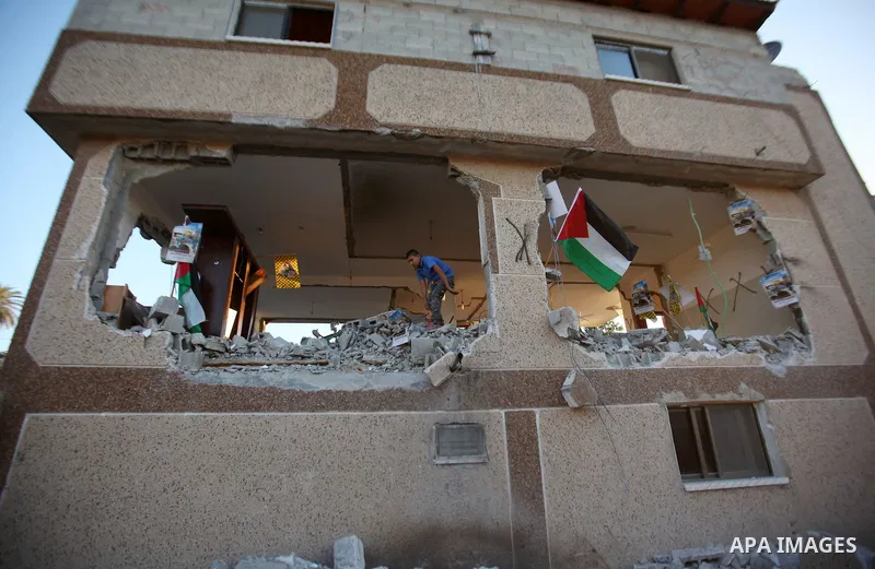 Palestinians inspect the home of the Bashar Masalha that was demolished by the Israeli military in the West bank city of Qalqilya, on June 21, 2016. Bashar Masalha was killed in Jaffa city on 8 March 2016, under the pret...