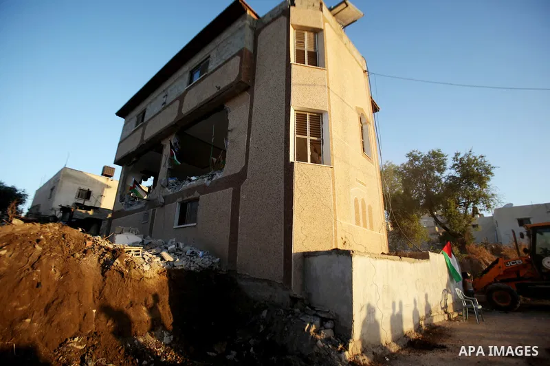 Palestinians inspect the home of the Bashar Masalha that was demolished by the Israeli military in the West bank city of Qalqilya, on June 21, 2016. Bashar Masalha was killed in Jaffa city on 8 March 2016, under the pret...