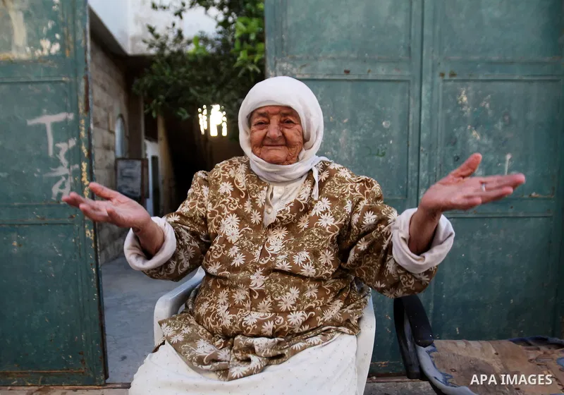 A Palestinian woman reacts in front of the home of the Bashar Masalha that was demolished by the Israeli military in the West bank city of Qalqilya, on June 21, 2016. Bashar Masalha was killed in Jaffa city on 8 March 20...