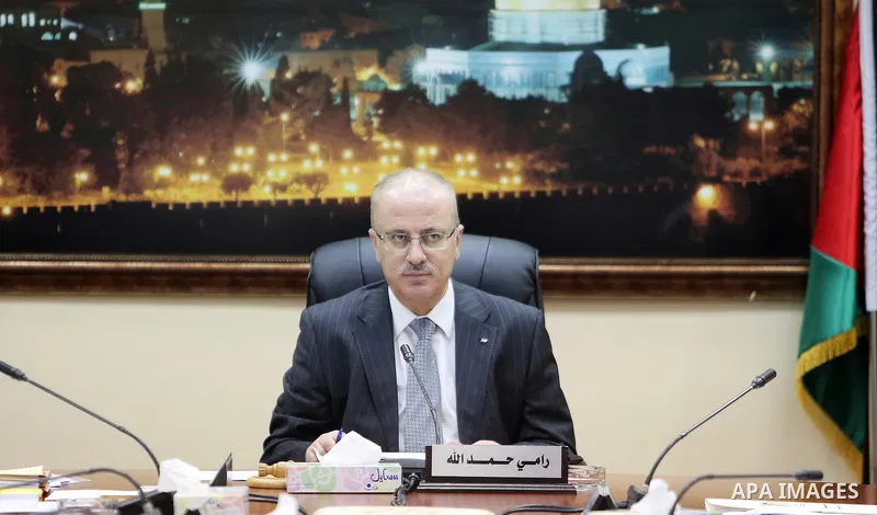 Palestinian Prime Minister, Rami Hamdallah, chairs a meeting of the Council of Ministers, in the West Bank city of Ramallah, on June 21, 2016. Photo by Prime Minister Office