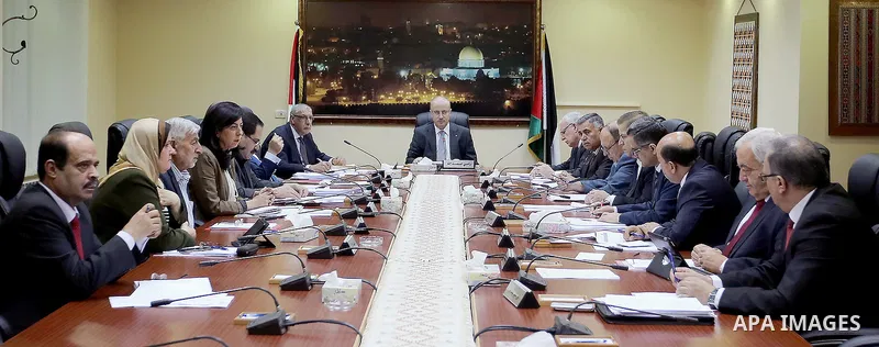 Palestinian Prime Minister, Rami Hamdallah, chairs a meeting of the Council of Ministers, in the West Bank city of Ramallah, on June 21, 2016. Photo by Prime Minister Office
