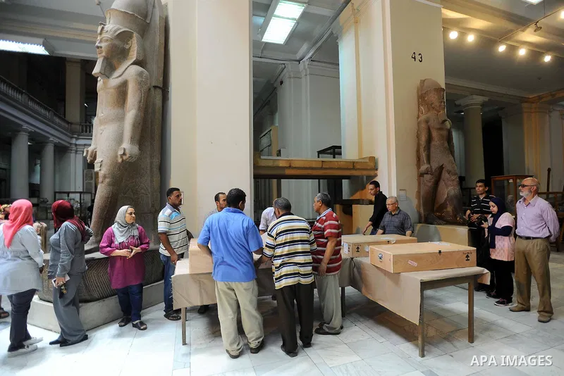Egyptian antiquities officials carry a lid of a sarcophagus on its arrival to the Egyptian Museum in Cairo, Egypt, on June 21, 2016. Two ancient Egyptian sarcophagus covers have been delivered to Cairo's Egyptian Museum...
