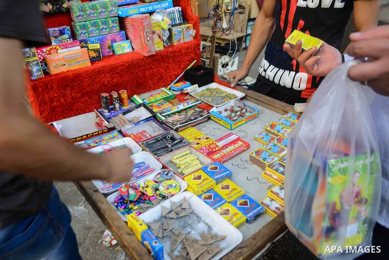 An Egyptian vendor sells fire crackers at a street market on the holy month of Ramadan, in the Cairo, Egypt, on June 23, 2016. Ramadan is sacred to Muslims because it is during that month that tradition says the Koran wa...