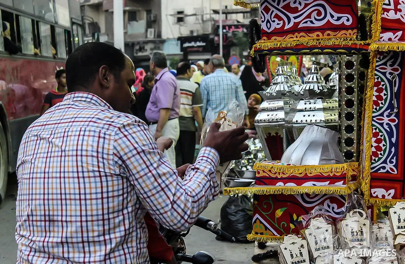 Egyptians shop at a market on the holy month of Ramadan in Cairo, Egypt, on June 24,2016. Muslims around the world refrain from eating, drinking and sexual intercourse from dawn till dusk during Ramadan, the holiest mont...