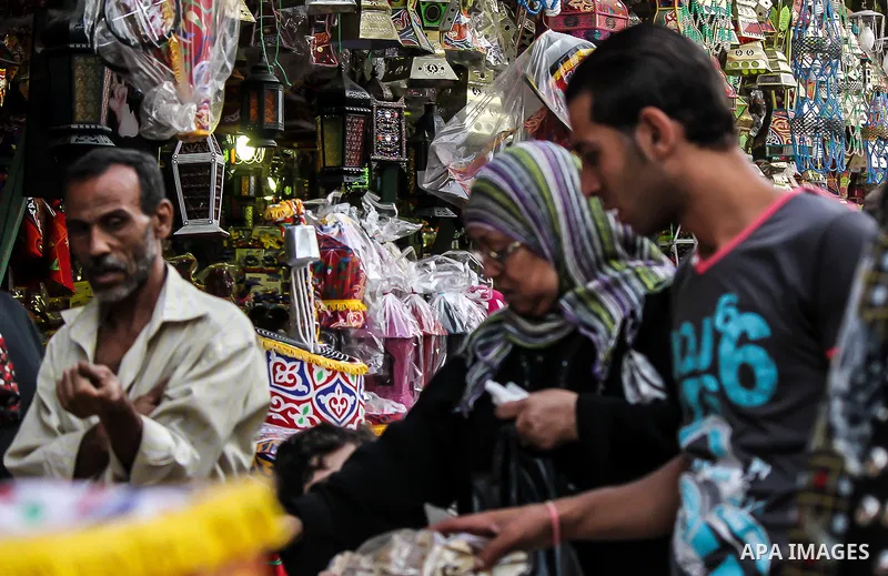 Egyptians shop at a market on the holy month of Ramadan in Cairo, Egypt, on June 24,2016. Muslims around the world refrain from eating, drinking and sexual intercourse from dawn till dusk during Ramadan, the holiest mont...