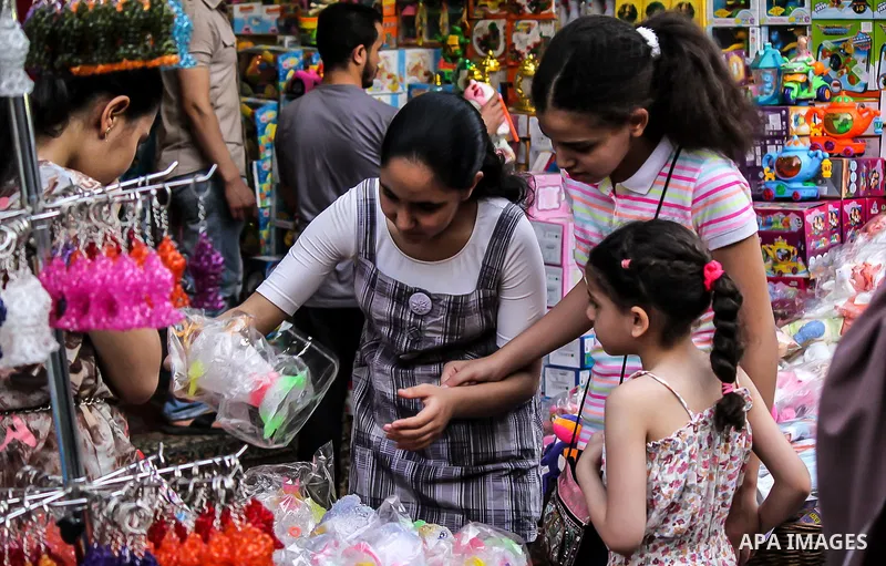 Egyptians shop at a market on the holy month of Ramadan in Cairo, Egypt, on June 24,2016. Muslims around the world refrain from eating, drinking and sexual intercourse from dawn till dusk during Ramadan, the holiest mont...