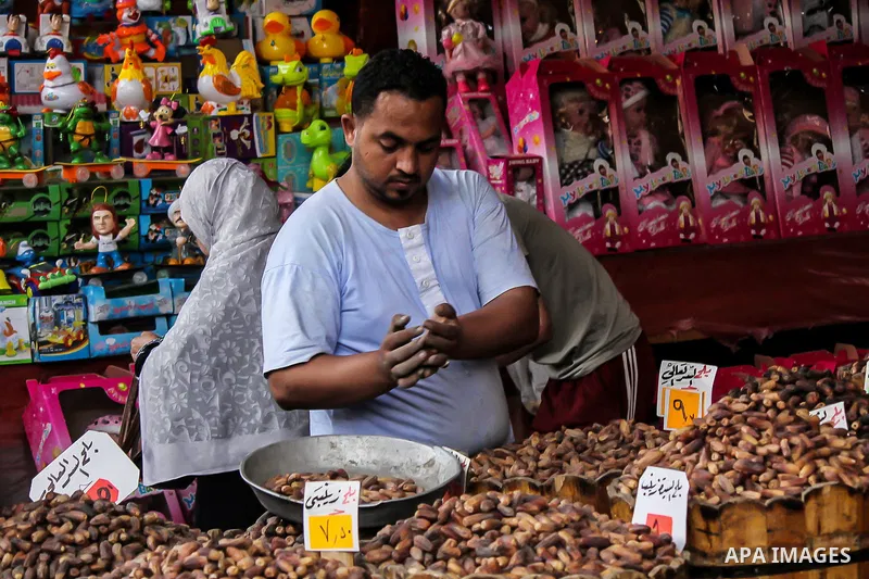 Egyptians shop at a market on the holy month of Ramadan in Cairo, Egypt, on June 24,2016. Muslims around the world refrain from eating, drinking and sexual intercourse from dawn till dusk during Ramadan, the holiest mont...