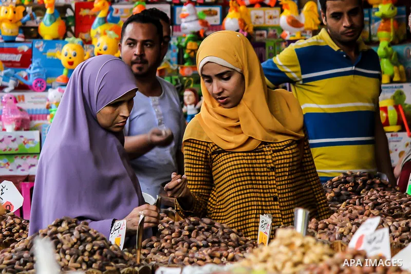 Egyptians shop at a market on the holy month of Ramadan in Cairo, Egypt, on June 24,2016. Muslims around the world refrain from eating, drinking and sexual intercourse from dawn till dusk during Ramadan, the holiest mont...