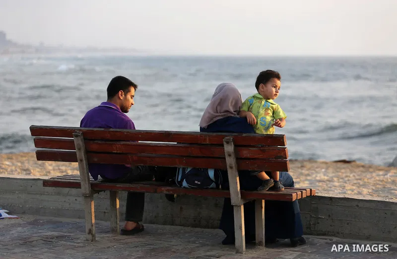 Palestinian muslims prepare to break their fast on the holy fasting month of Ramadan at the beach of the Mediterranean sea on the coast of Gaza city during a hot day, on June 24, 2016. Ramadan is sacred to Muslims becaus...