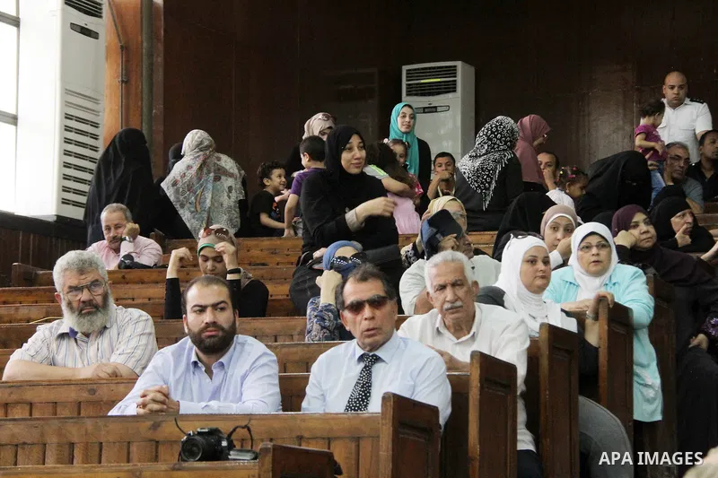 Relatives of Ansar Bait Al-Maqdis group attend their trial in Cairo on June 25, 2016, on charges of assassination of police officers, attempted assassination of interior minister Mohamed Ibrahim and explosions near secur...