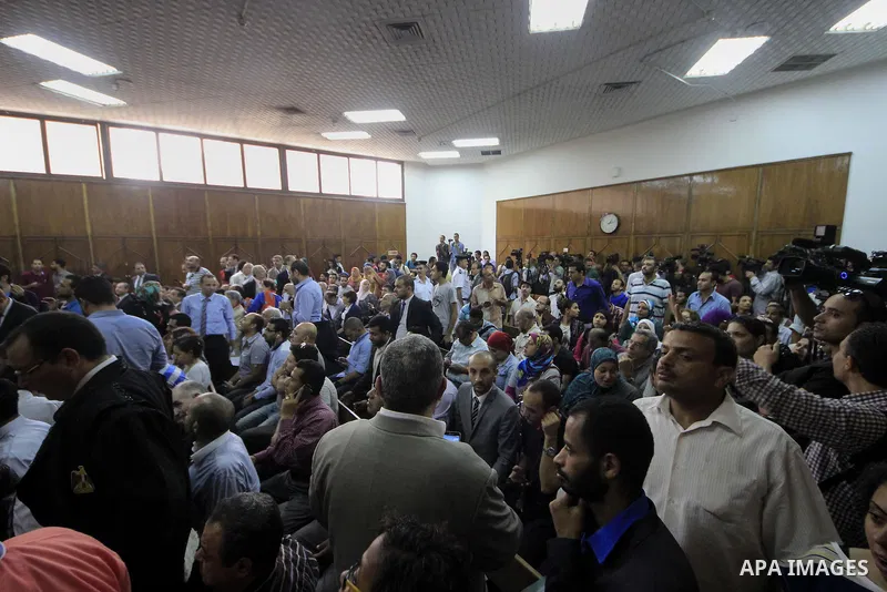 Egyptians hold banners and shout slogan during a protest in front of the State Council courthouse after a ruling against the Egypt-Saudi border demarcation agreement, Cairo, Egypt, 26 June 2016. The Administrative Court...
