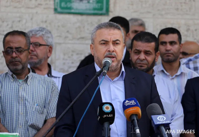 Palestinians take part in a protest demanding release the prisoners in Israeli jails, in front of Red cross office, in Gaza city, on June 27, 2016. Photo by Mohammed Asad