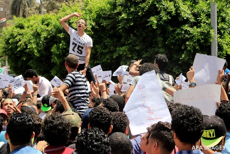 Egyptian students take part during a protest against cancelled a high school final exam in front of education ministry, in Cairo, Egypt, on June 27, 2016. Egypt cancelled a high school final exam yesterday after papers f...