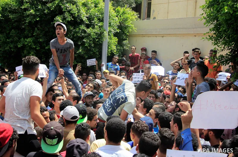 Egyptian students take part during a protest against cancelled a high school final exam in front of education ministry, in Cairo, Egypt, on June 27, 2016. Egypt cancelled a high school final exam yesterday after papers f...