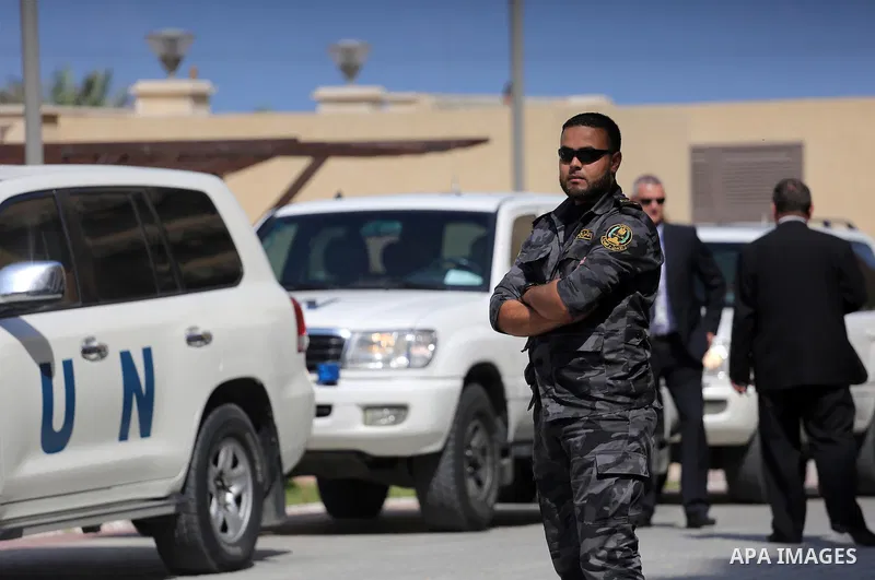 A member of Palestinian security forces loyal to Hamas stands guard during the U.N. Secretary-General Ban Ki-moon visits a Qatari-funded rehabilitation and artificial limbs hospital in the northern Gaza Strip June 28, 20...