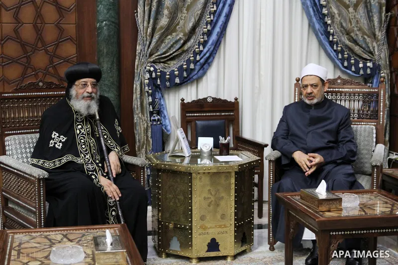 Pope Tawadros II of Alexandria visits Sheikh Ahmed Mohamed el-Tayeb, Egyptian Imam of al-Azhar Mosque, to congratulate him ahead of the Eid al-Fitr holiday marking the end of Ramadan, in Cairo, Egypt, on June 28, 2016. P...