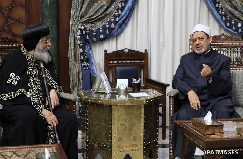 Pope Tawadros II of Alexandria visits Sheikh Ahmed Mohamed el-Tayeb, Egyptian Imam of al-Azhar Mosque, to congratulate him ahead of the Eid al-Fitr holiday marking the end of Ramadan, in Cairo, Egypt, on June 28, 2016. P...