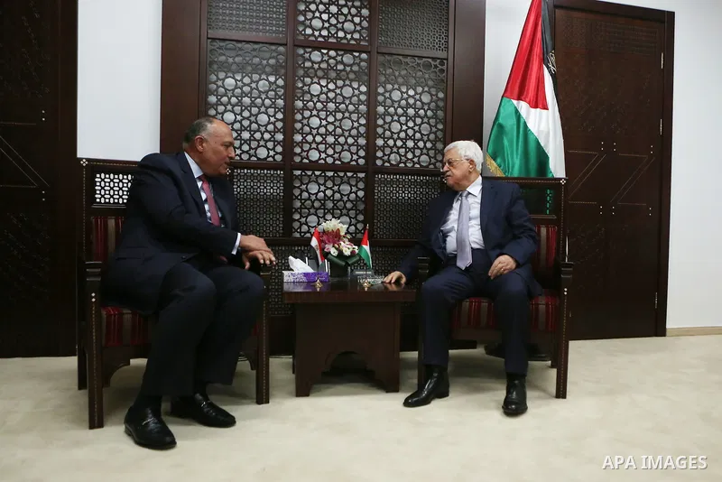Palestinian President Mahmoud Abbas meets with Egyptian Foreign Minister Sameh Shoukry during a visit to the Palestinian authority headquarters in the West Bank city of Ramallah on June 29, 2016. Photo by Shadi Hatem