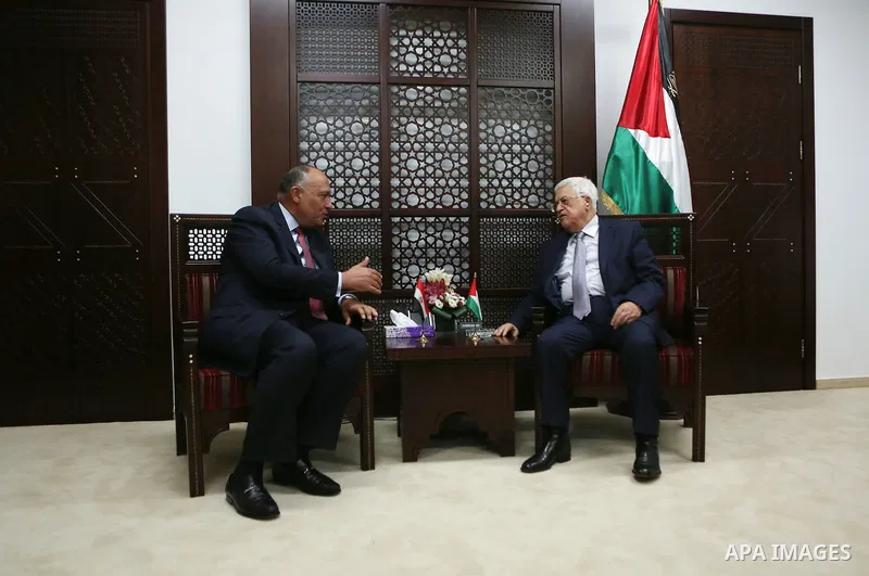 Palestinian President Mahmoud Abbas meets with Egyptian Foreign Minister Sameh Shoukry during a visit to the Palestinian authority headquarters in the West Bank city of Ramallah on June 29, 2016. Photo by Shadi Hatem