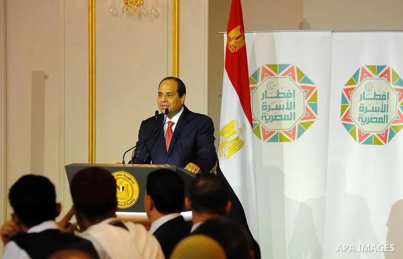 Egyptian President Abdel-Fattah al-Sisi takes part in the Egyptian family breakfast, during the Muslim holy month of Ramadan, in Cairo, on June 29, 2016. Photo by Egyptian President Office