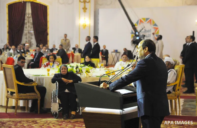 Egyptian President Abdel-Fattah al-Sisi takes part in the Egyptian family breakfast, during the Muslim holy month of Ramadan, in Cairo, on June 29, 2016. Photo by Egyptian President Office