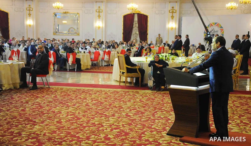 Egyptian President Abdel-Fattah al-Sisi takes part in the Egyptian family breakfast, during the Muslim holy month of Ramadan, in Cairo, on June 29, 2016. Photo by Egyptian President Office