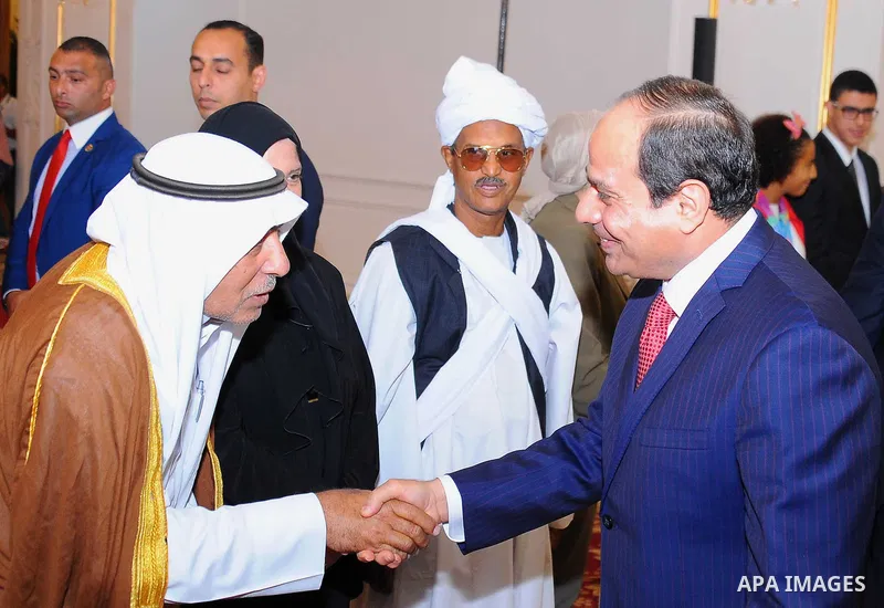 Egyptian President Abdel-Fattah al-Sisi takes part in the Egyptian family breakfast, during the Muslim holy month of Ramadan, in Cairo, on June 29, 2016. Photo by Egyptian President Office