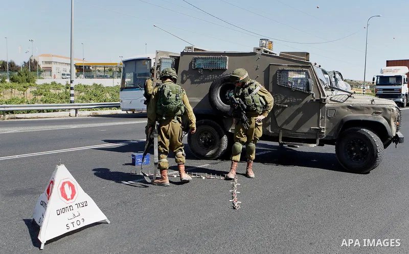 Israeli security forces gather near the scene of what the Israeli military said was an attack by Palestinian in the Jewish settlement of Kiryat Arba near the West Bank city of Hebron 30 June 2016. Israeli army said the P...